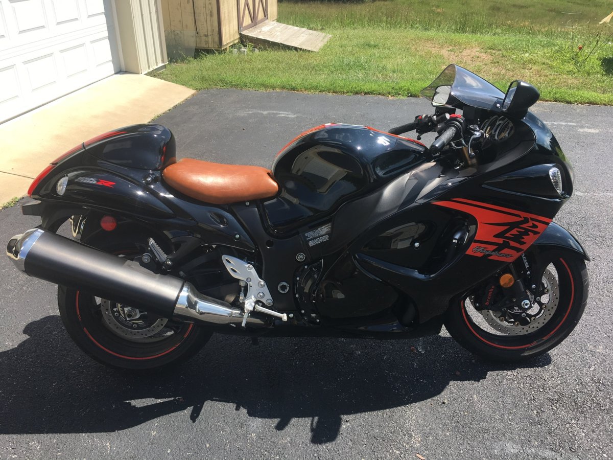 Black motorcycle deals brown seat