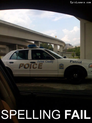 fail-owned-police-car-door-spelling.jpg